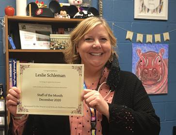 woman holding a certificate